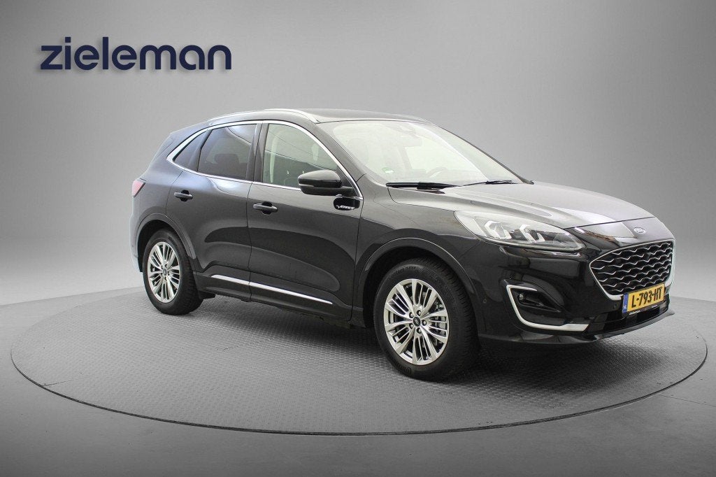 Ford KUGA 2.5 PHEV Vignale - Carplay, Camera, Leer, Stoel/St, Auto's, Ford, Gebruikt, 4 cilinders, Met garantie (alle), Zwart