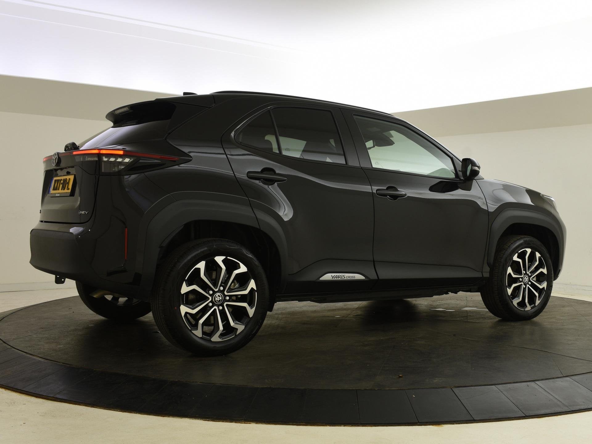 Toyota Yaris Cross 1.5 Hybrid 115 Business Plus, Auto's, 12 maanden, Stof, Gebruikt, 116 pk