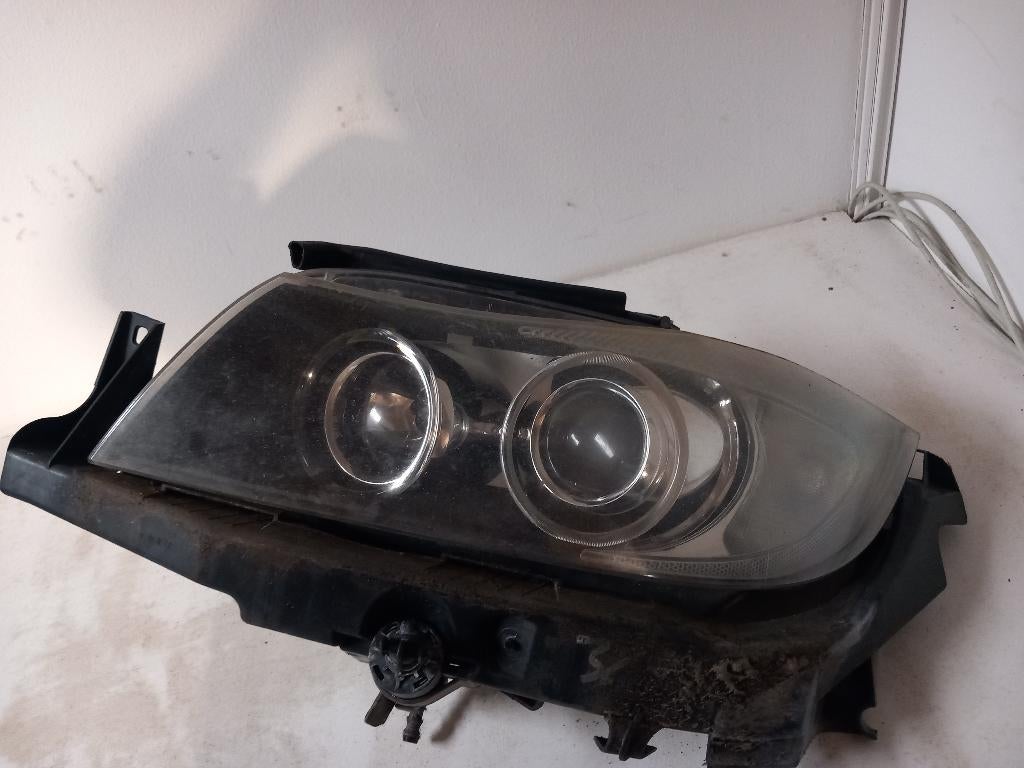 BMW E90 E91 Koplamp Links Bi-Xenon AHL 63116942737 COMPLEET, Gebruikt, Info@bmw.nl., Ophalen of Verzenden, BMWstraat 1