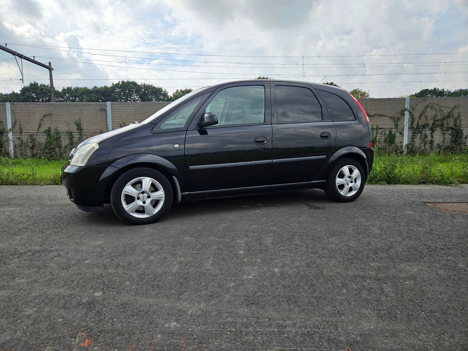 Opel Meriva 1.6 16V 2004 Zwart, Auto's, Voorwielaandrijving, 4 cilinders, 100 pk, Zwart