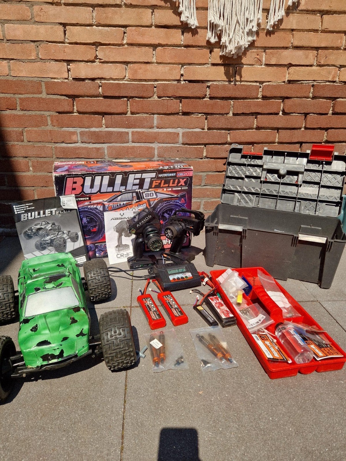 RC Auto Bullet Flux 60 km/u met extra's en onderdelen, Gebruikt, Auto offroad, Schaal 1:10, RTR (Ready to Run)