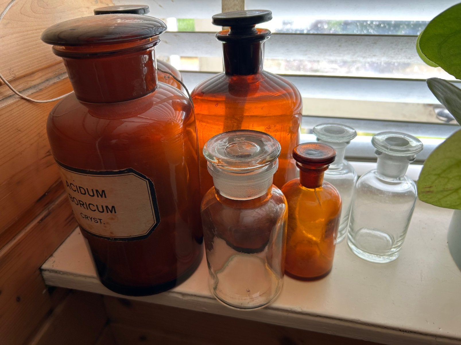 7 Apothekersflessen, Ophalen