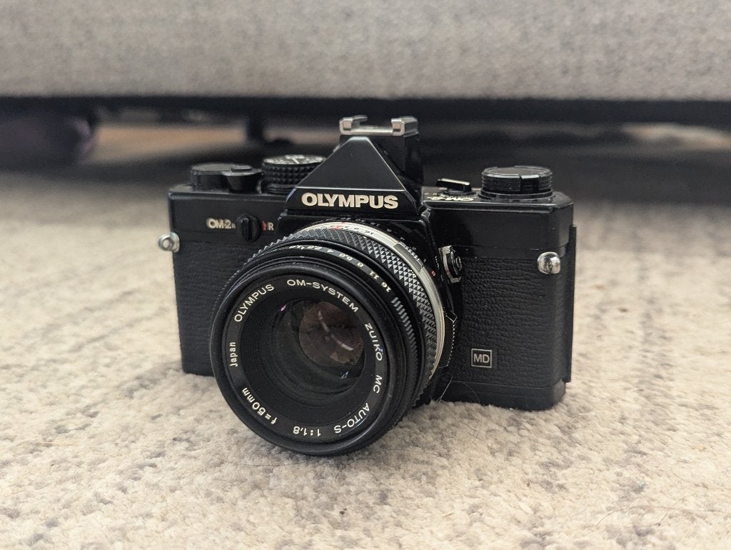 Olympus OM 2n, Audio, Tv en Foto, Fotocamera's Analoog, Ophalen of Verzenden, Gebruikt, Spiegelreflex, Olympus