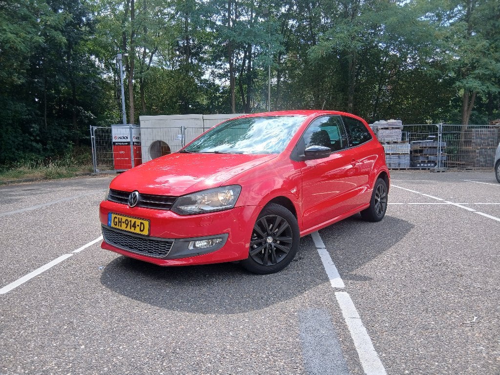 Volkswagen Polo 1.2 51KW 2011 Rood, Auto's, Voorwielaandrijving, 40 €/maand, Zwart, 1198 cc