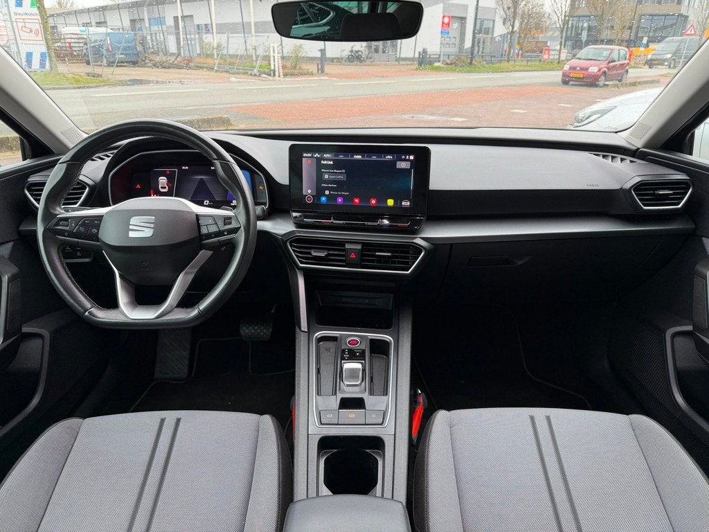 Seat Leon Sportstourer 1.0 eTSI Style Business Intense AUTOM, Auto's, Seat, 12 maanden, Stof, Gebruikt, Euro 6