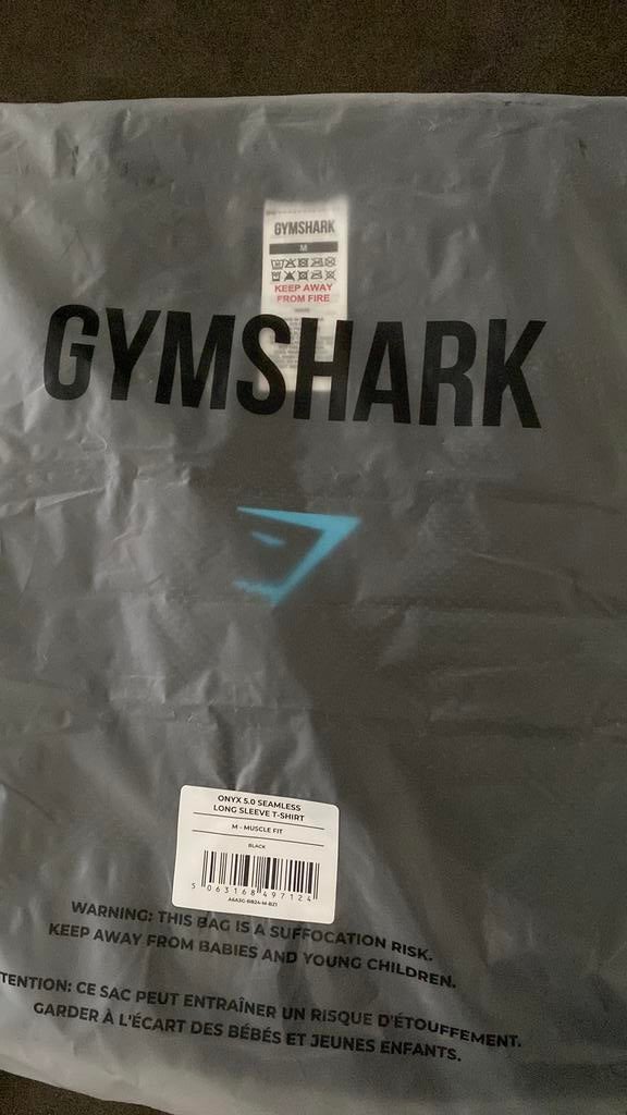 Gymshark Onyx 5.0 Seamless Long Sleeve M blue logo 🟦, Kleding | Heren, Sportkleding, Fitness, Maat 48/50 (M), Zwart, Nieuw