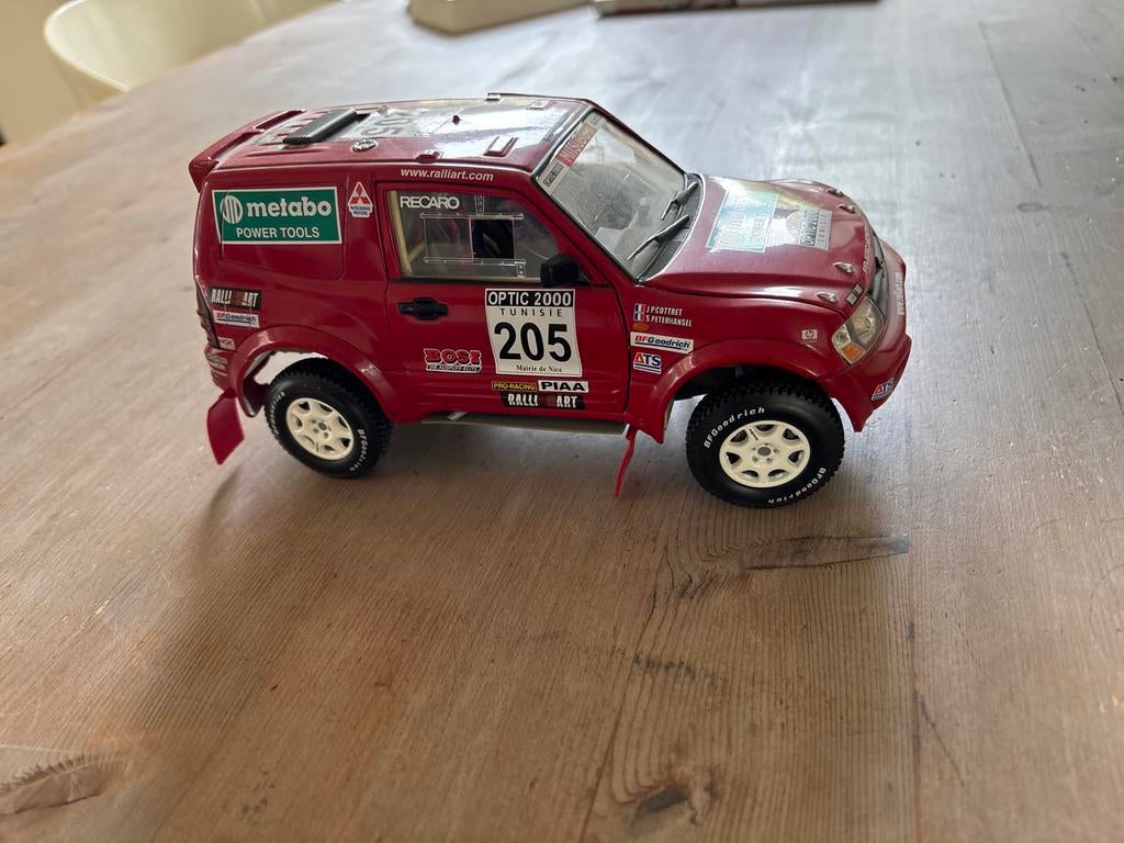 Mitsubishi Pajero Montero Rally Optic 2000 schaalmodel, Ophalen of Verzenden, Zo goed als nieuw, Auto, Overige merken