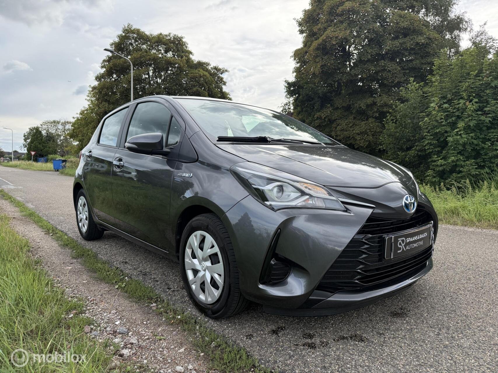 Toyota Yaris 1.5 Hybrid Dynamic / Invalide Auto / Cam / Navi, Auto's, 4 cilinders, Origineel Nederlands, Bedrijf, Hybride Elektrisch/Benzine