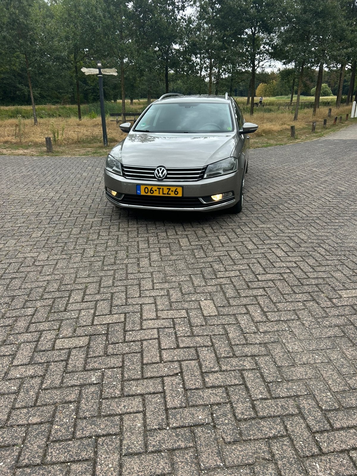 Volkswagen Passat 1.4 TSI 90KW Variant DSG 2012 Bruin, Auto's, Volkswagen, Euro 5, Stof, Navigatiesysteem, Zwart