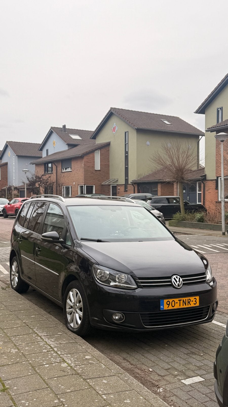 Volkswagen Touran 1.2 TSI 77KW BMT 7P 2012 Zwart, Auto's, Voorwielaandrijving, 4 cilinders, 7 stoelen, Zwart