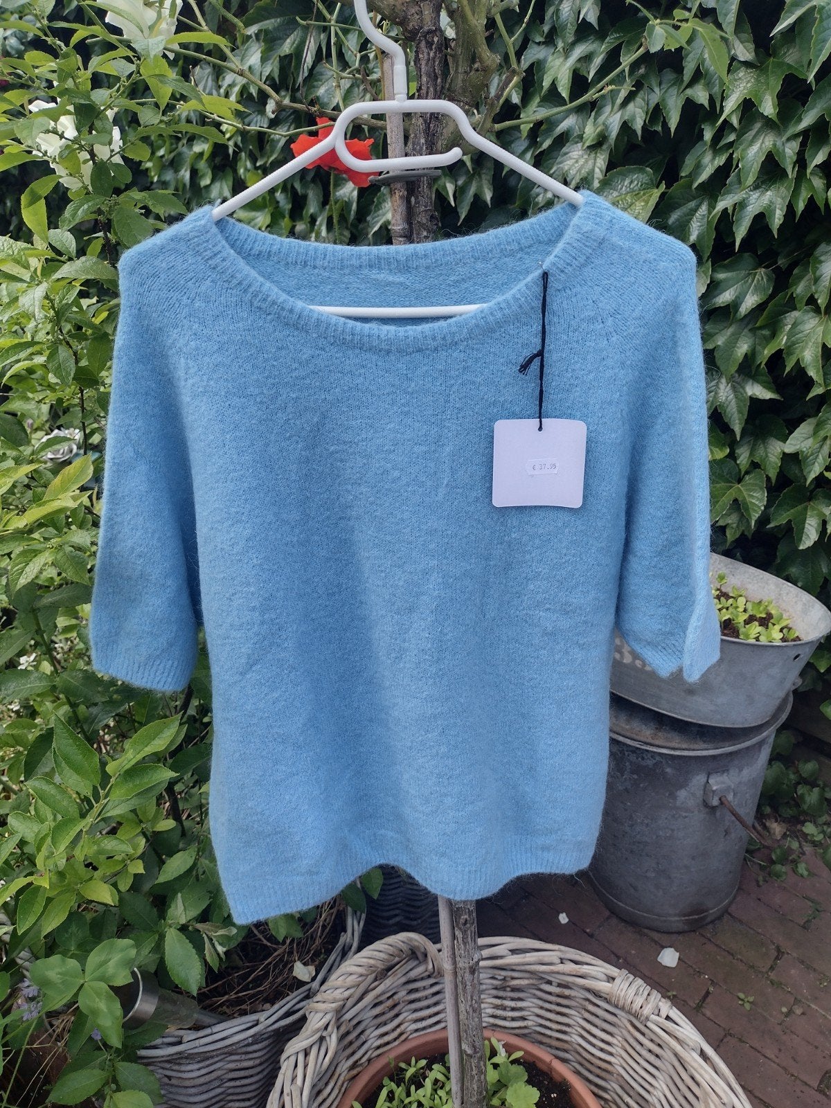 Lichtblauwe trui met korte mouwen 40 42., Maat 38/40 (M), Blauw, Ophalen of Verzenden, Onbekend
