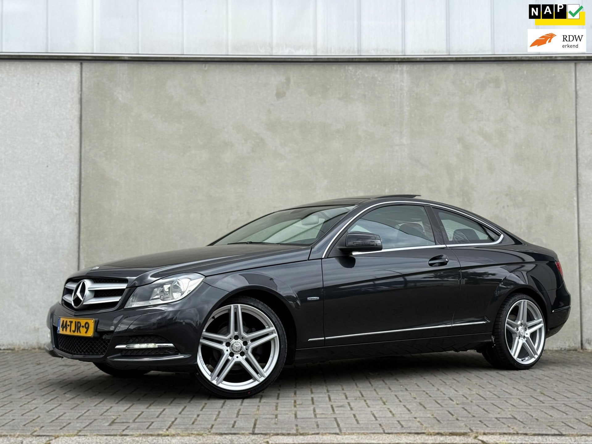Mercedes-Benz C-klasse Coupé 180 Ambition AMG Pano 19inch D, Auto's, Automaat, Euro 5, Zwart, 4 stoelen