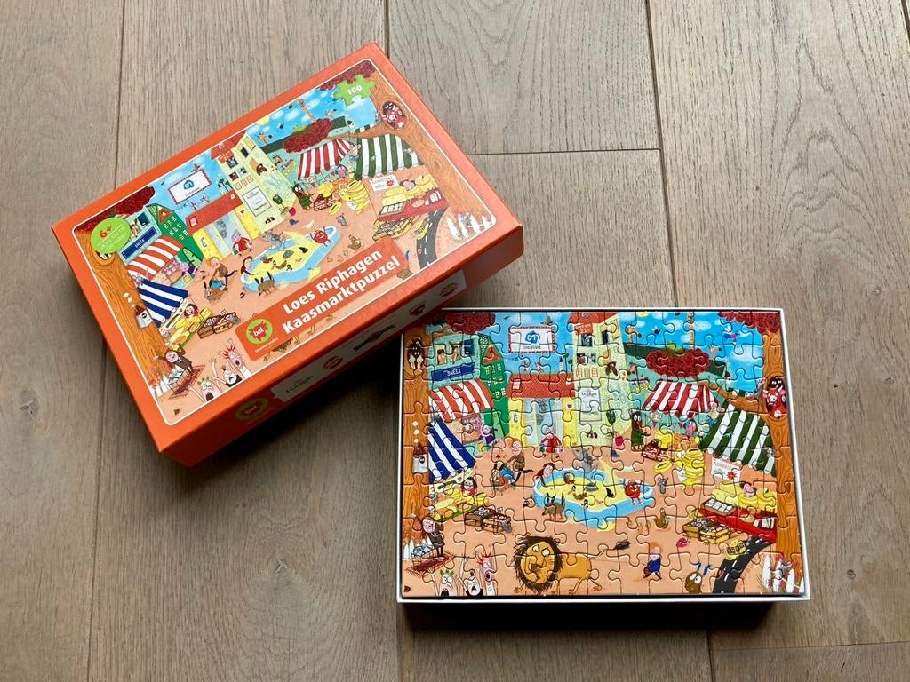Kaasmarkt Puzzel - Loes Riphagen, Ophalen of Verzenden, Meer dan 50 stukjes, Zo goed als nieuw, 6 jaar of ouder