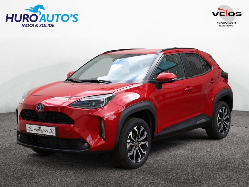 Toyota Yaris Cross 1.5 Hybrid 130 Dynamic | Stoel/Stuurwielv, Auto's, Stof, Gebruikt, 1490 cc, Grijs