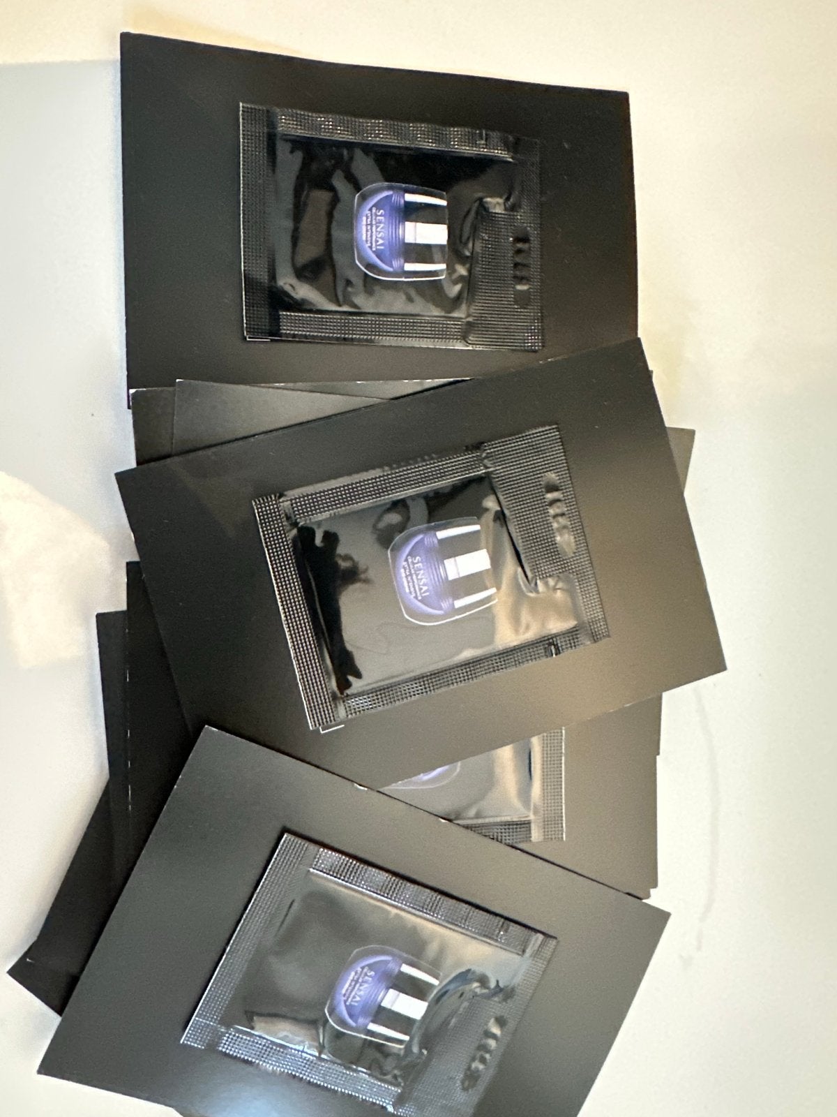 11 stuks nieuwe Sensai samples, Ophalen of Verzenden, Nieuw, Gehele gezicht, Verzorging
