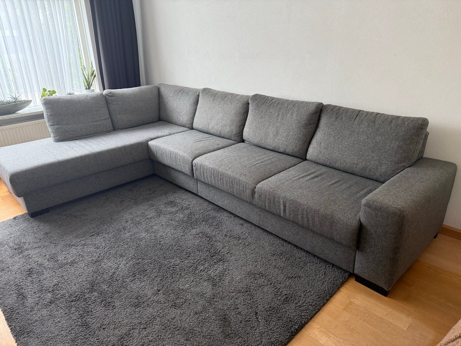 Grijze hoekbank van Pronto Wonen - 335x210 cm, Huis en Inrichting, Ophalen, Gebruikt, Hoekbank, 300 cm of meer