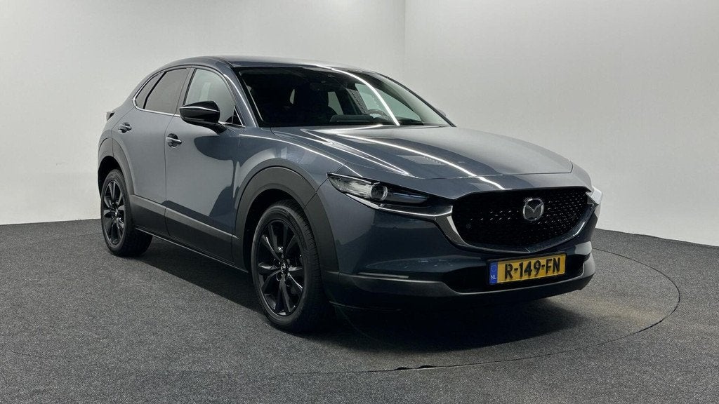 Mazda CX-30 2.0 e-SkyActiv-X M Hybrid Homura NAVI CAMERA ECC, Auto's, Voorwielaandrijving, 1998 cc, Stof, Gebruikt