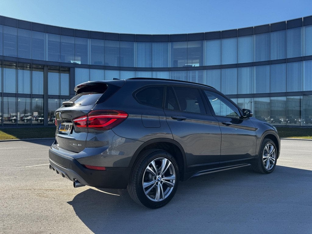 BMW X1 sDrive20i Executive, Auto's, Stof, Euro 6, Bedrijf, SUV of Terreinwagen
