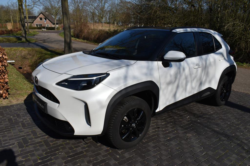Toyota Yaris Cross 1.5 Hybrid '23 Adventure, Pano, NIEUWSTAA, Stof, Gebruikt, Met garantie (alle), Wit