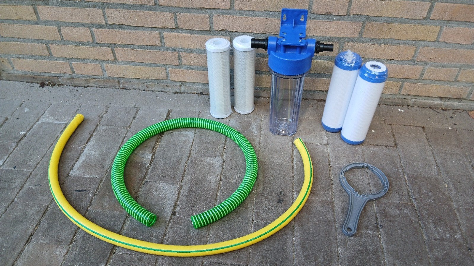 Waterfilterset met slangen en nieuwe filters, Ophalen of Verzenden