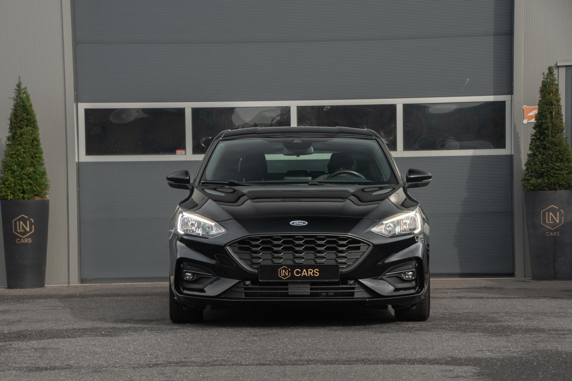 Ford Focus 1.0 EcoBoost Titanium ST-line| Cruise | Navi, Auto's, Ford, Gebruikt, Met garantie (alle), Zwart, Bedrijf