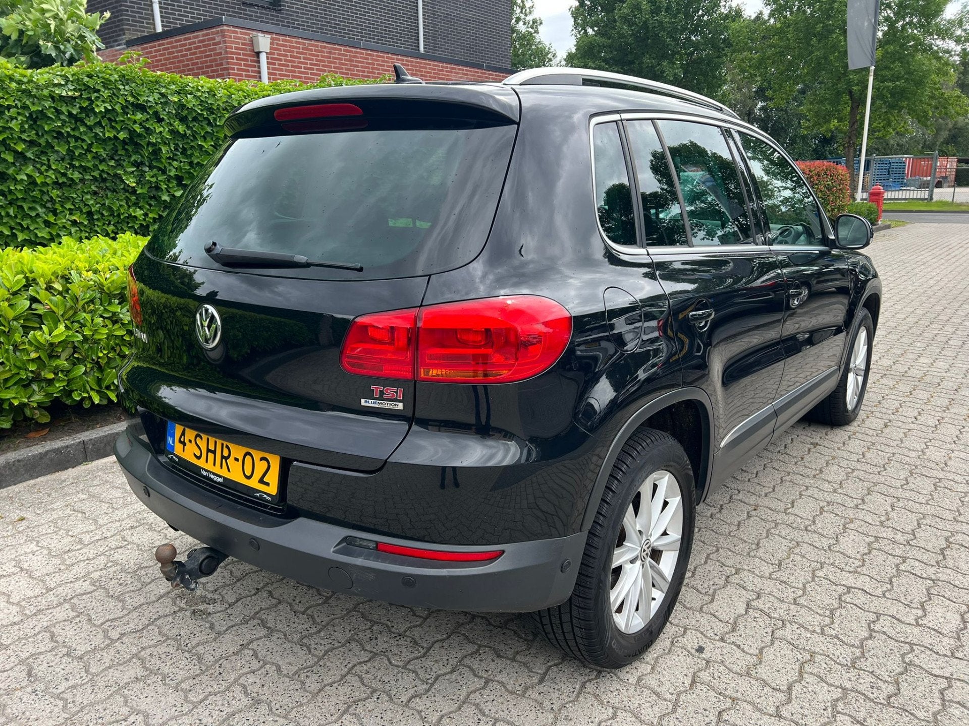 Volkswagen Tiguan 1.4 TSI Sport&Style pano, xenon, cruise, n, Auto's, Euro 5, Stof, Zwart, 4 cilinders