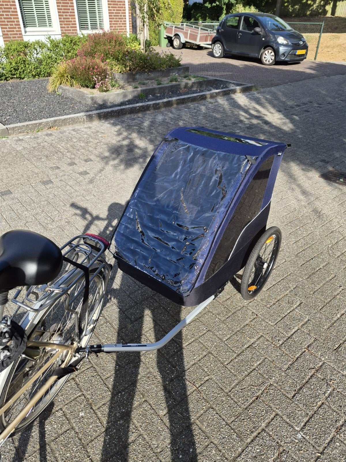 Polisport fietskar voor 2 kinderen - zo goed als nieuw, Fietsen en Brommers, Fietsaccessoires | Aanhangers en Karren, Ophalen