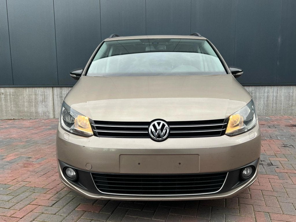 Volkswagen Touran 1.2 TSI Highline BlueMotion * Navi * Cruis, Auto's, Volkswagen, Gebruikt, Zwart, 4 cilinders, Origineel Nederlands
