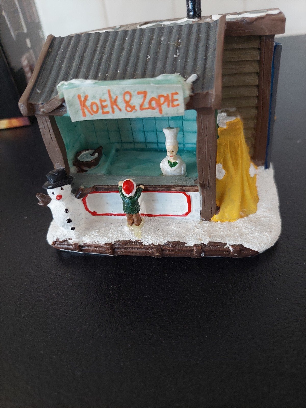 kerst, koek en zopie kraam, kraam ijsbaan, Ophalen