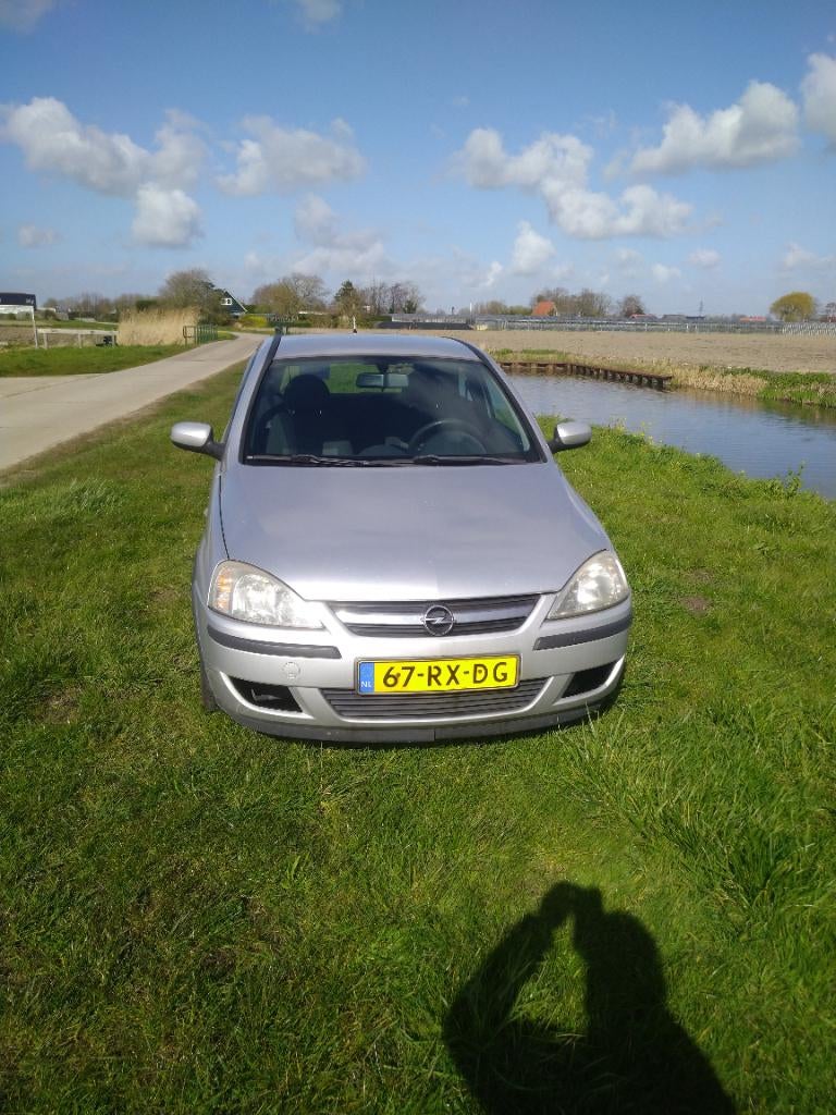 Opel Corsa 1.2 16V Twinport 3D 2005 Grijs, Auto's, Opel, Particulier, Corsa, ABS, Airbags, Airconditioning, Lichtmetalen velgen
