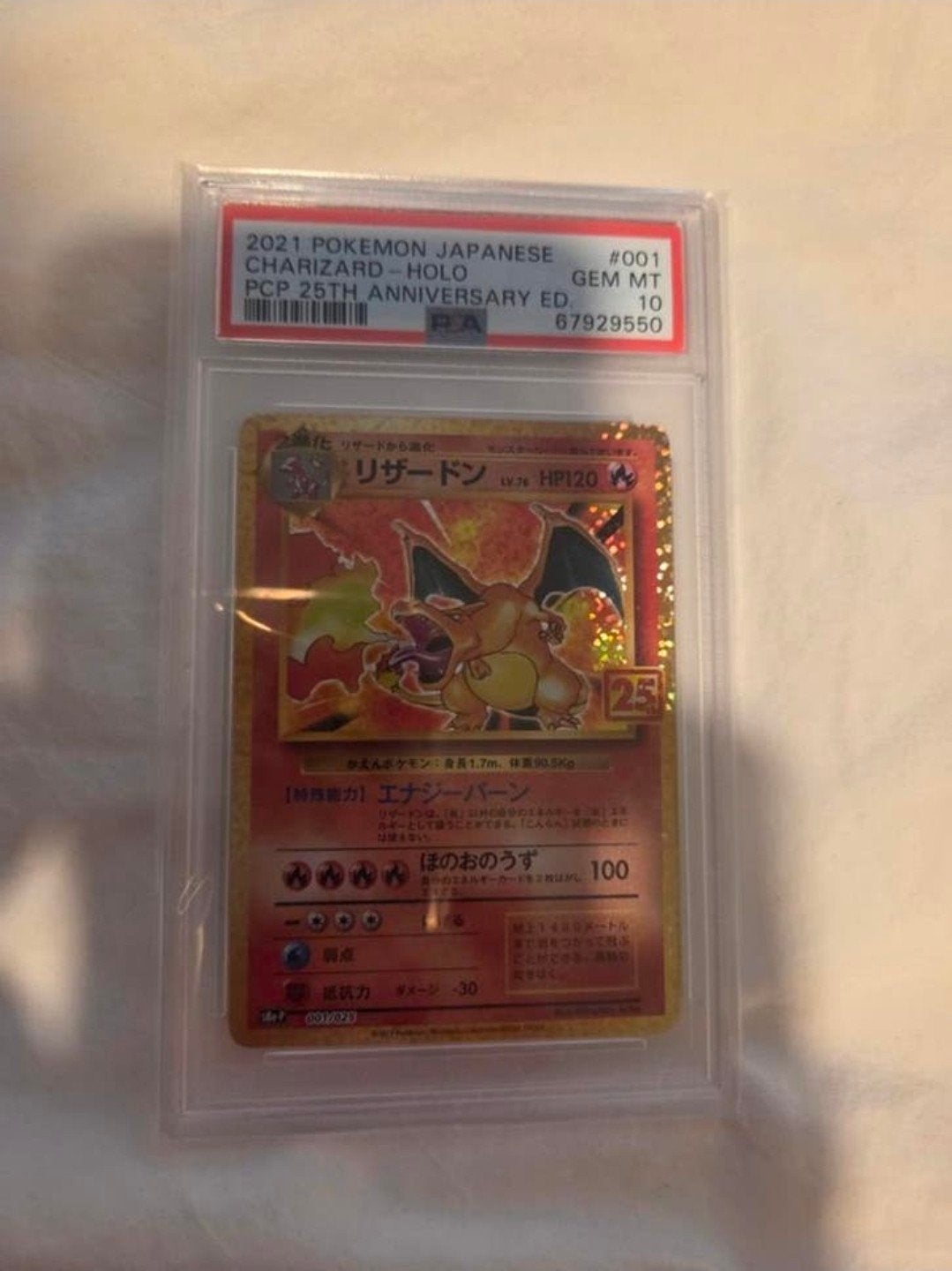 Japanse Charizard 25th Anniversary Holo PSA 10, Ophalen of Verzenden