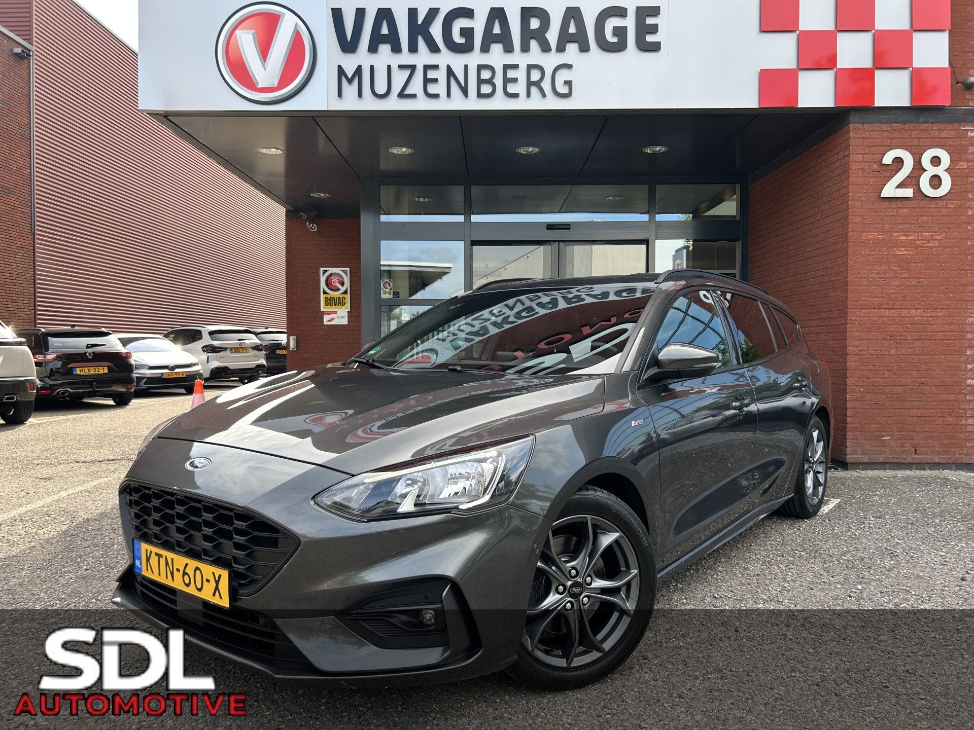 Ford FOCUS Wagon 1.5 EcoBoost ST Line // AFN. TREKHAAK // KE, Auto's, Dealer onderhouden, Stof, Zwart, 150 pk