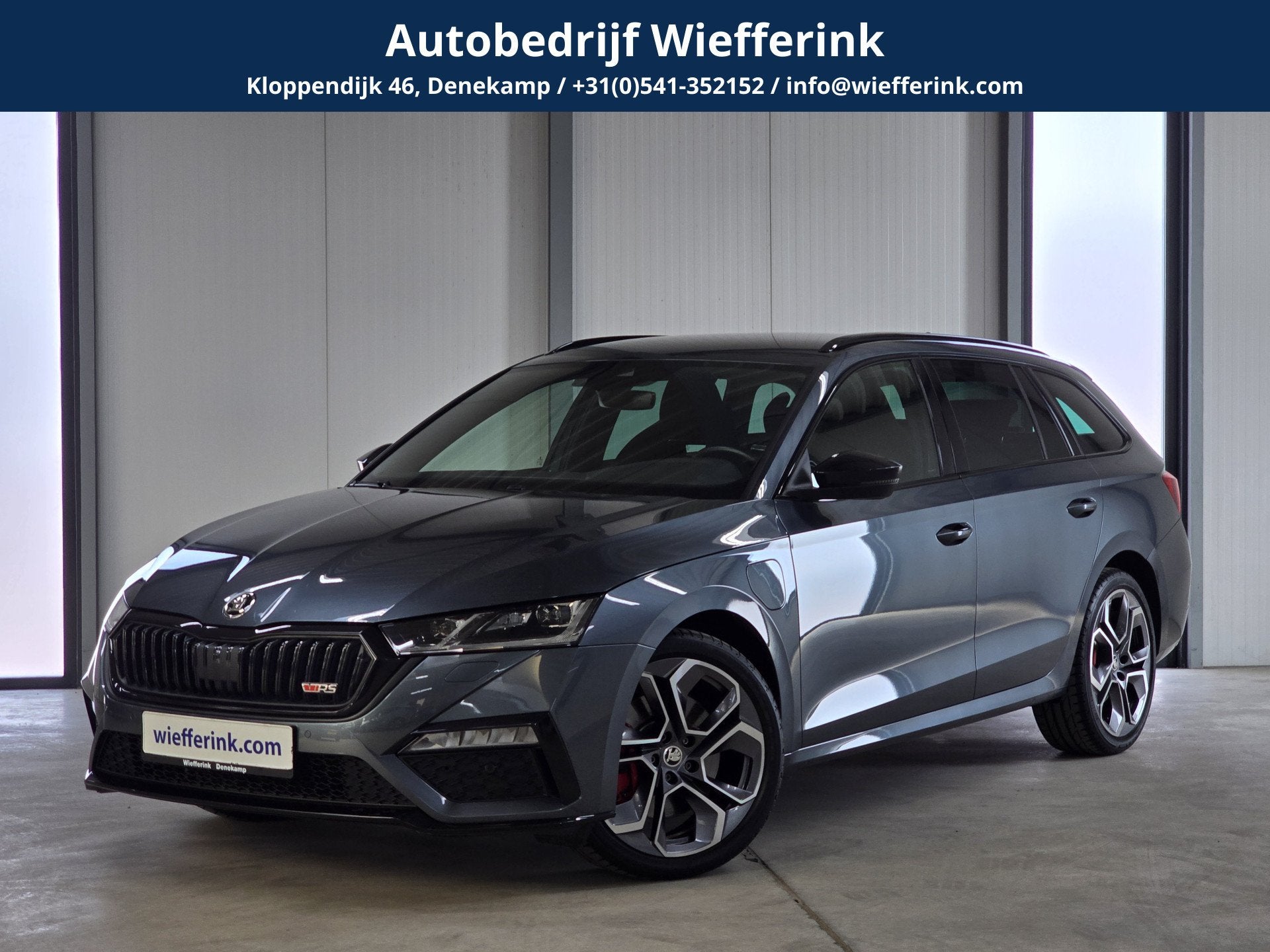 Skoda Octavia Combi 1.4 TSI RS iV PHEV Business | Acc | Came, Auto's, Gebruikt, 4 cilinders, Hybride Elektrisch/Benzine, Te koop