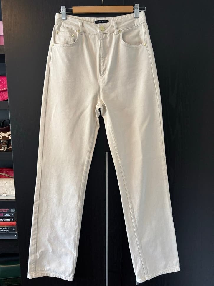Nikkie jeans creme met wijde pijpen maat 29, Beige, Ophalen of Verzenden, Zo goed als nieuw, Maat 36 (S)