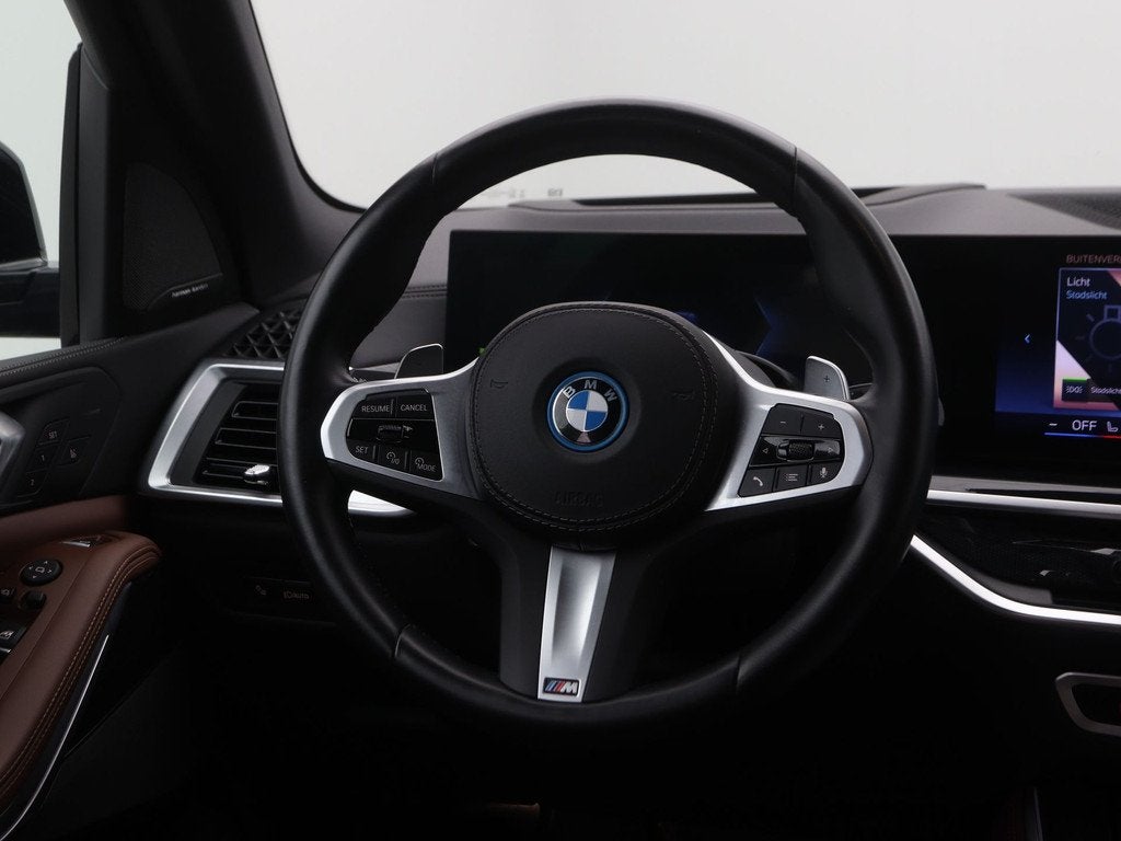 BMW X5 xDrive50e Launch Edition (bj 2023, automaat), Auto's, BMW, 2395 kg, Met garantie (alle), Overige brandstoffen, Zwart
