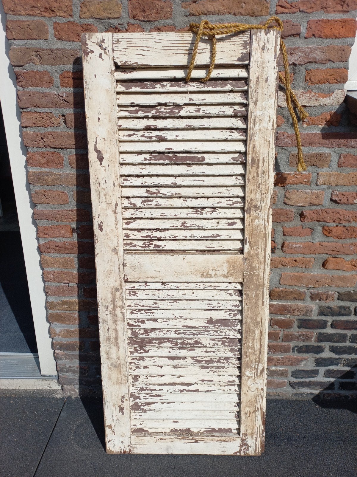 Oud louvreluik, Ophalen