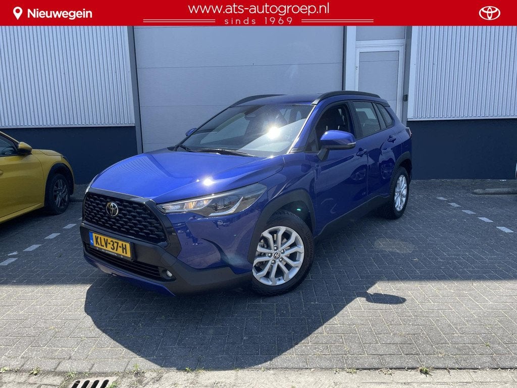 Toyota Corolla Cross Hybrid 140 Business | Parkeersensoren V, Auto's, Stof, Blauw, Bedrijf, Hybride Elektrisch/Benzine