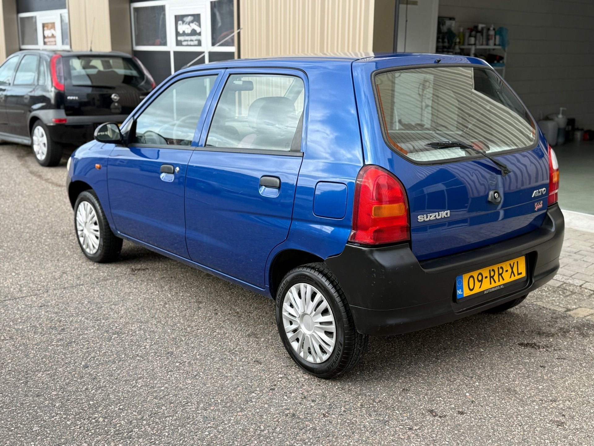 Suzuki Alto 1.1 GX Spirit APK 07/2027, Auto's, Voorwielaandrijving, 4 cilinders, Met garantie (alle), Blauw