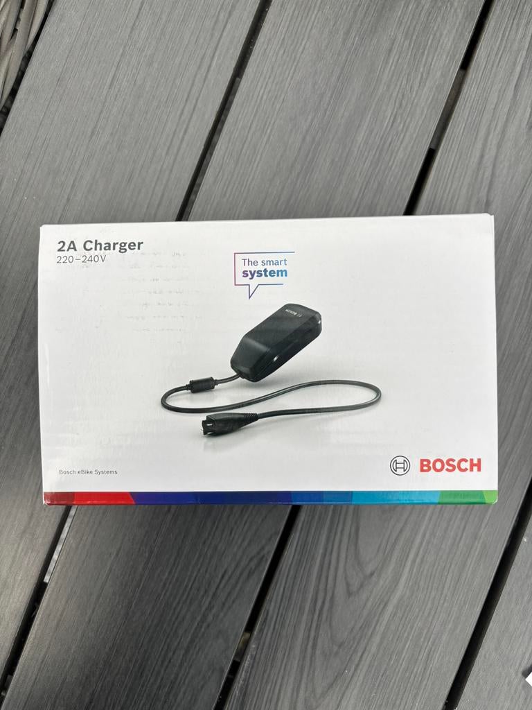 Bosch Smart Elektrische fietsoplader - 36V - 2A, Fietsen en Brommers, Fietsaccessoires | Overige Fietsaccessoires, Ophalen of Verzenden