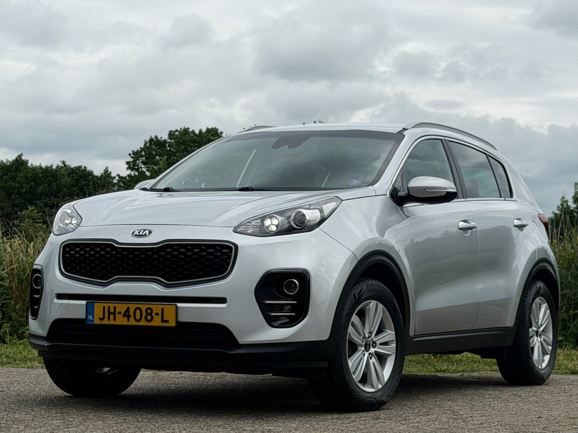 Kia Sportage 1.6 GDI First Edition - Sparkling Silver - Trek, Auto's, Kia, Voorwielaandrijving, Stof, Gebruikt, 4 cilinders