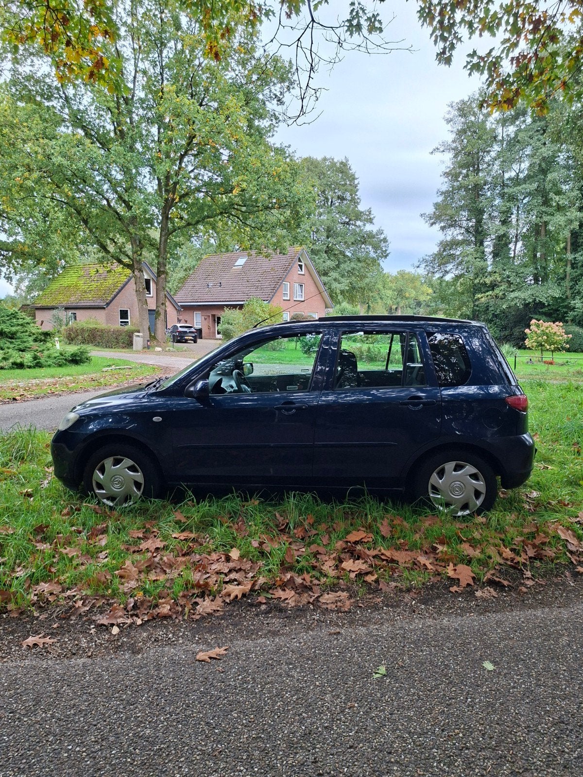 Mazda 2 1.4 16V 2004 Blauw, Auto's, Voorwielaandrijving, 1025 kg, 40 €/maand, Zwart