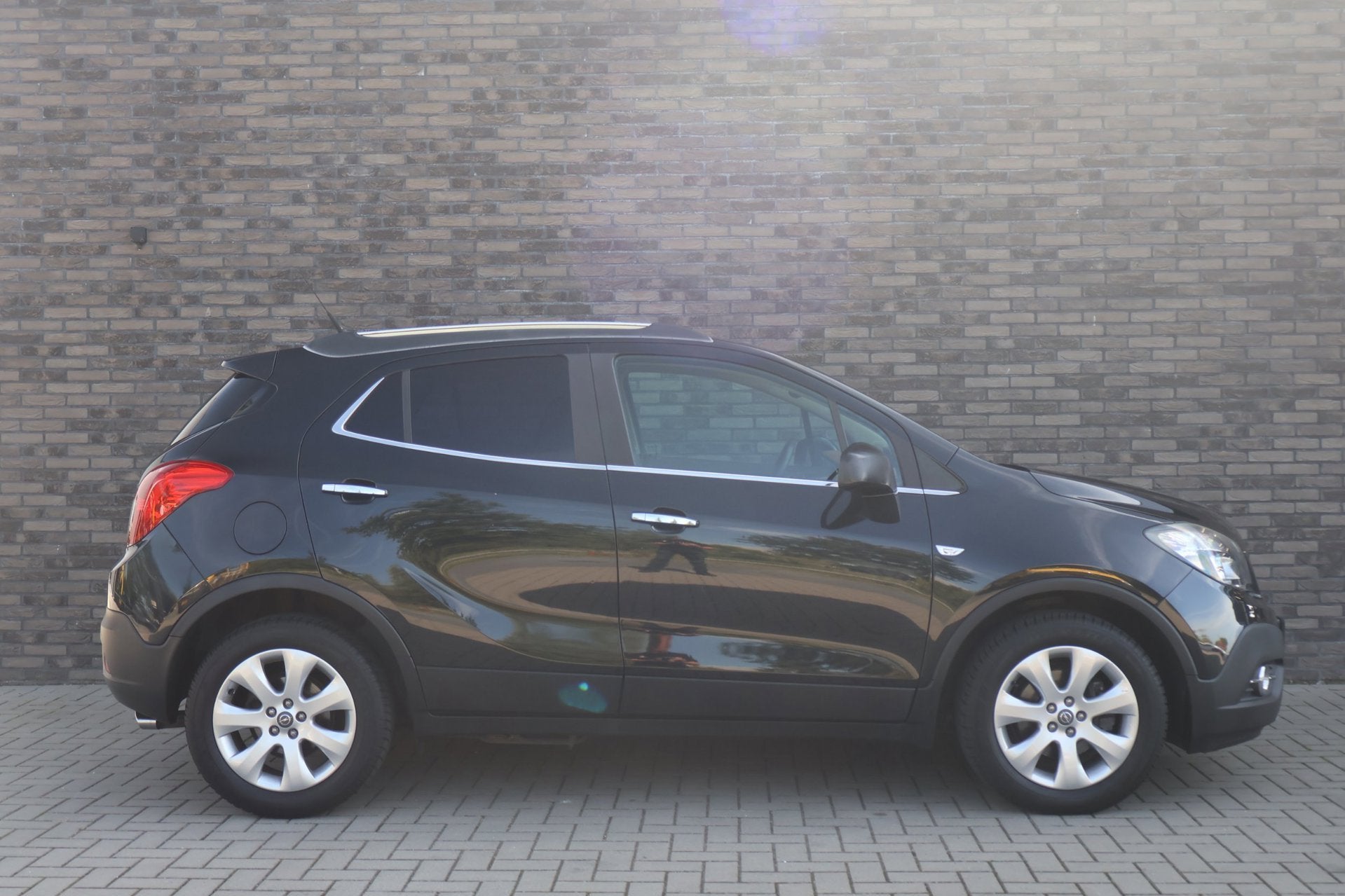 Opel Mokka 1.4 T Cosmo 4x4 | Camera | Trekhaak | Schuifdak |, Auto's, 1325 kg, Gebruikt, 4 cilinders, Zwart
