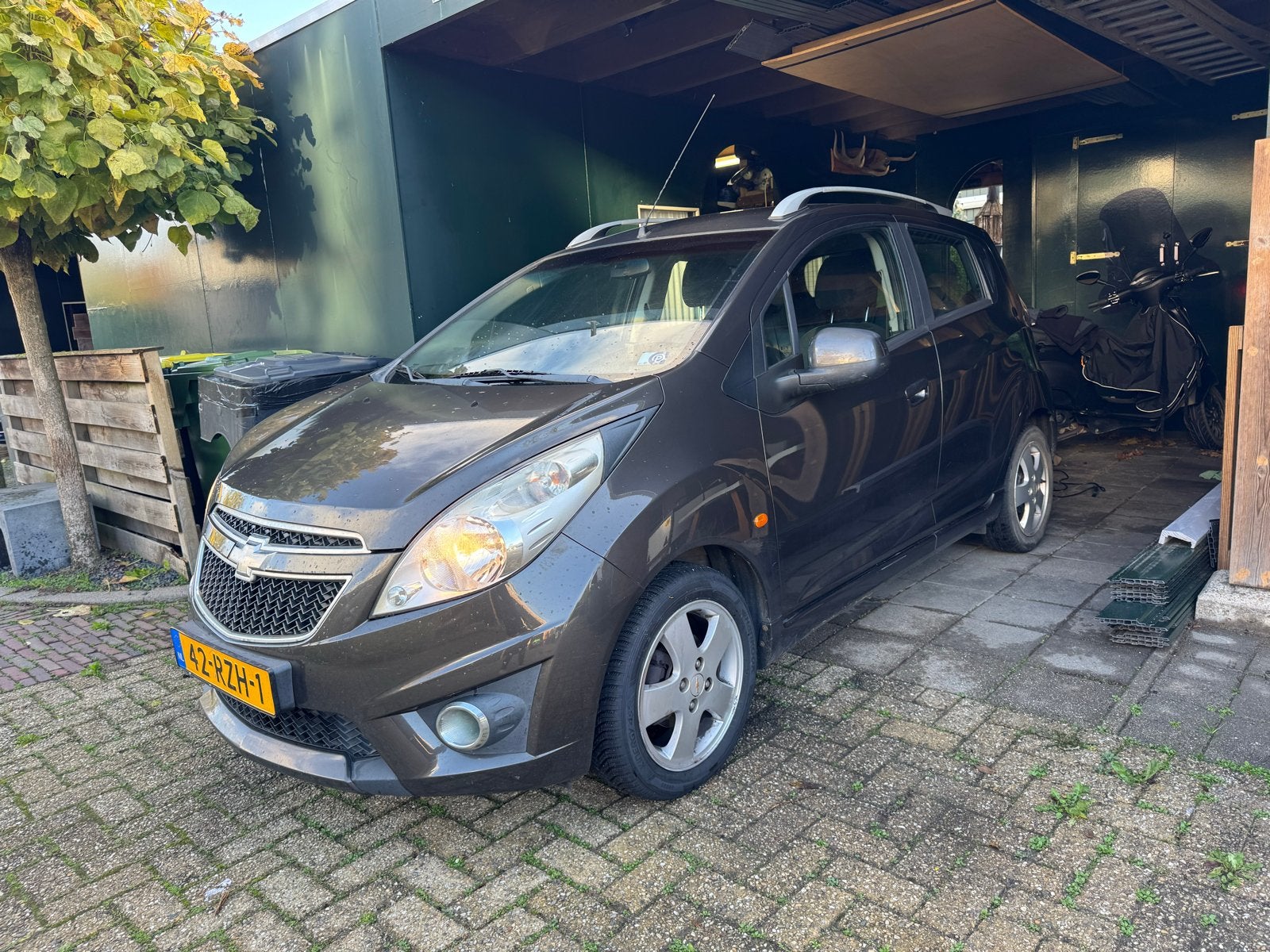 Chevrolet Spark 1.2 2011 Bruin 5 deurs, Auto's, Voorwielaandrijving, 4 cilinders, Bruin, 82 pk