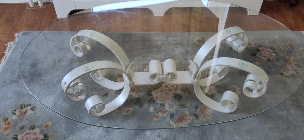 Ovale salontafel met glazen blad en smeedijzeren voet, Ophalen, 100 tot 150 cm, 50 tot 100 cm, Zo goed als nieuw
