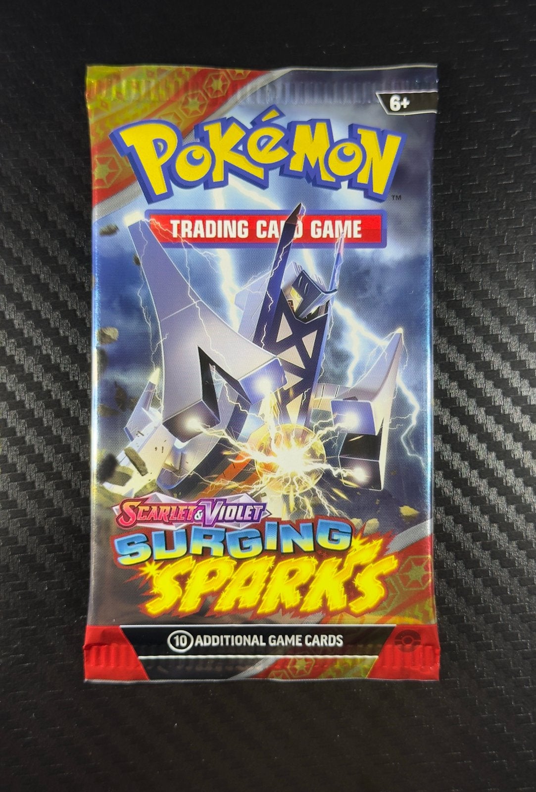 Pokémon Surging Sparks | Booster Pack | English | 10 Cards, Ophalen of Verzenden, Zo goed als nieuw, Booster