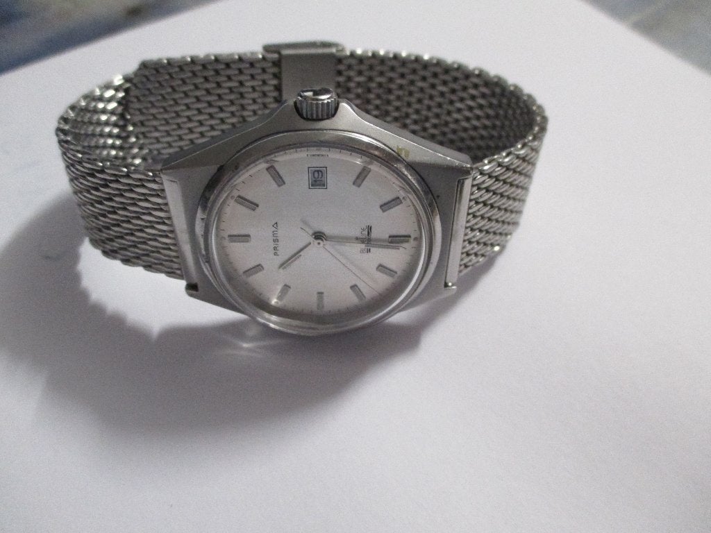 LUXE VINTAGE HEREN PRISMA BLEU LINE QUARTZ 10 ATM TOPSTAAT!!, Ophalen of Verzenden, Staal, Overige merken, 1960 of later