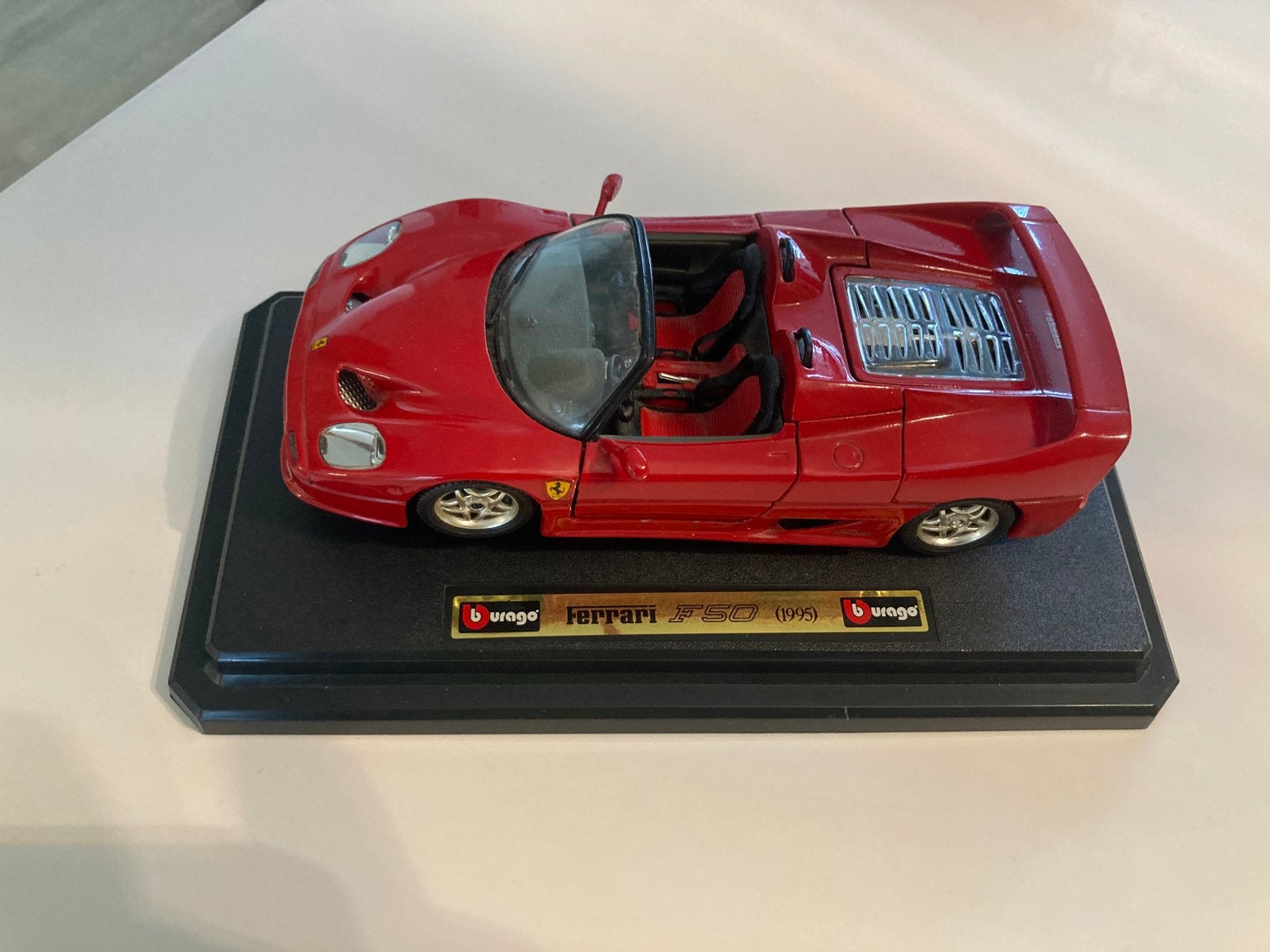 Ferrari f50 1995 1/24, Hobby en Vrije tijd, Ophalen of Verzenden, Zo goed als nieuw, Bburago