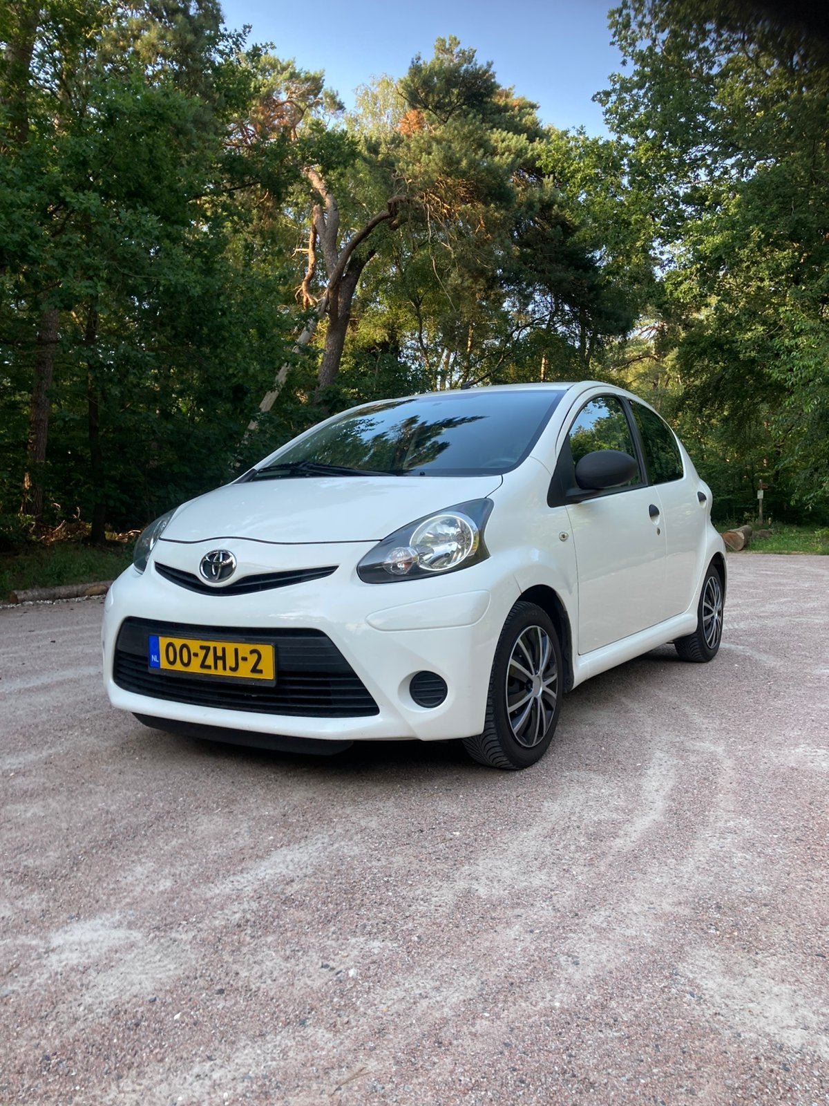 Toyota Aygo 1.0 12V Vvt-i 5DRS 2012 Wit, Voorwielaandrijving, 4 stoelen, Origineel Nederlands, Handgeschakeld