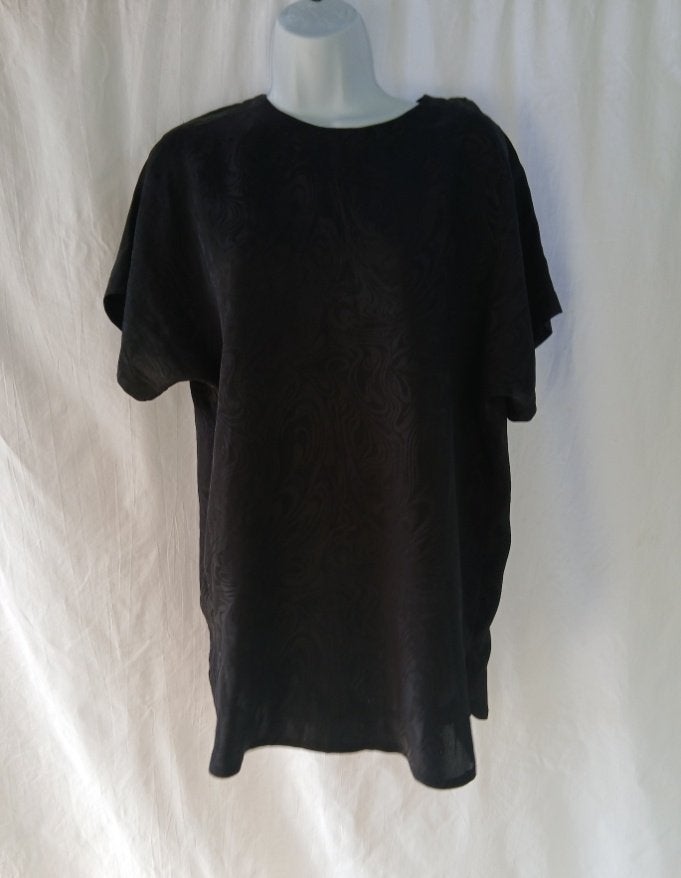 Leuk lang zwart dames shirt met aparte print mt 40, Kleding | Dames, Maat 38/40 (M), Carnaval, ., Ophalen of Verzenden
