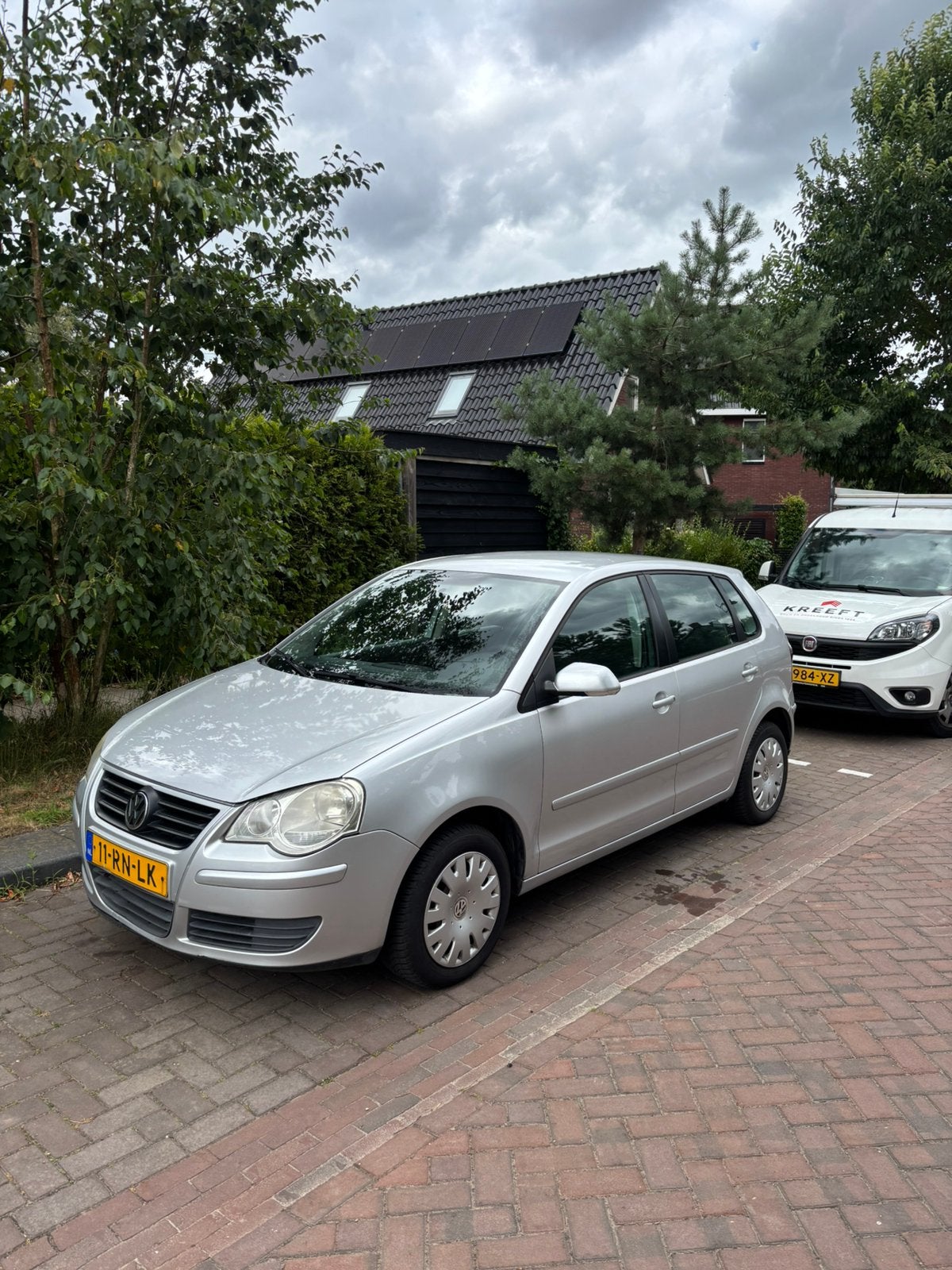 Volkswagen Polo 1.4 2005 grijs/zilver, Auto's, Volkswagen, Voorwielaandrijving, Origineel Nederlands, Handgeschakeld, Grijs